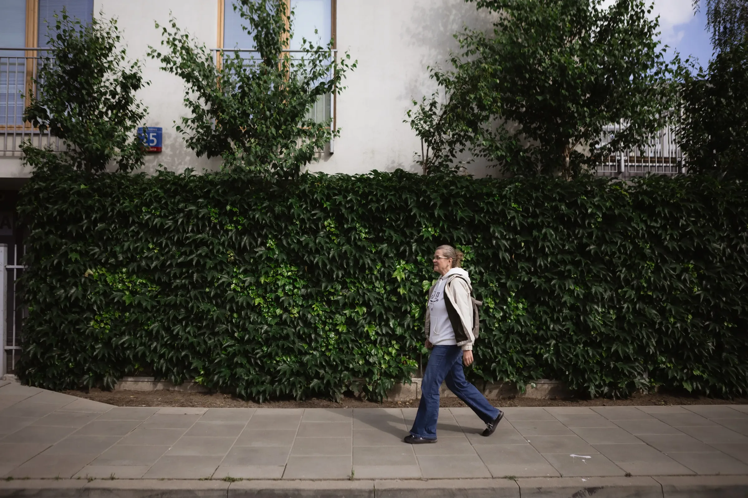 Anna Skryhan walks down a street in Warsaw, where she started a new life after her release from prison. 